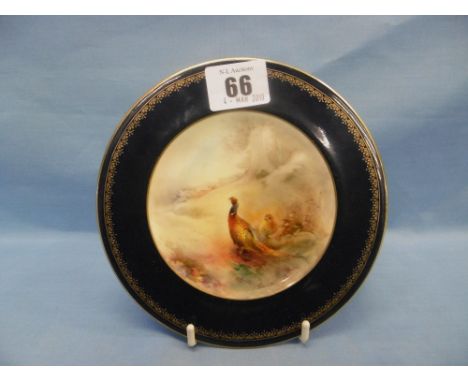 A hand painted Royal Worcester plate decorated with pheasants artist James Stinton