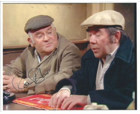 Ronnie Barker signed 10 x 8 colour classic Two Ronnies Sketch Photo.  Good Condition. All signed items come with our certific