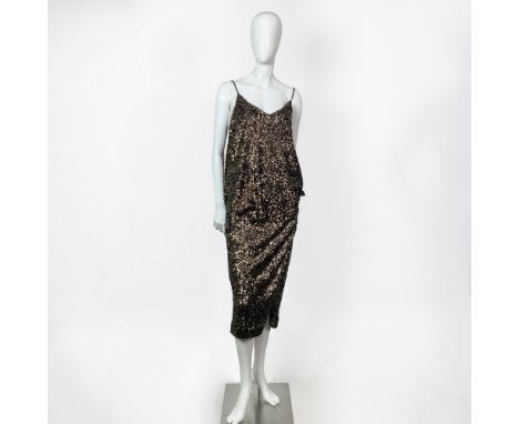 Vintage Metaphor two pieces cocktail set that includes a gold color sequined spaghetti strap flare V top and matching skirt w