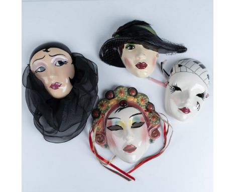 Fabulous collection of ceramic masks with backing to help decorate your walls that includes a Cast of Millions model of a wom