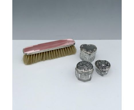 Charming sterling silver collection consisting of three vanity boxes with their lids backstamped Sterling 16g, and an enamel 