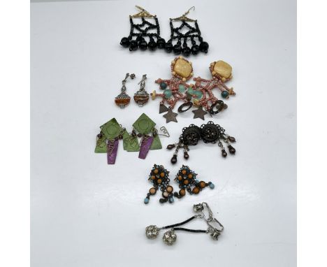 Mixed lot of earrings with beadwork, vintage metal designs, whimsical designs and evening wear. Includes both clip and pierce