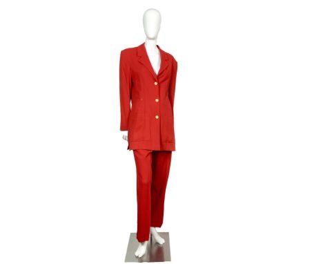 Original Escada Margaretha Ley scarlet red wool pants suit. The jacket features a notched collar, three large gold color Esca