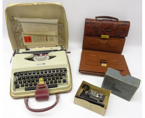 Folding leatherette writing case, Underwood typewriter in case and a 'Brinco' Brand stapler in original box (3) Condition Rep