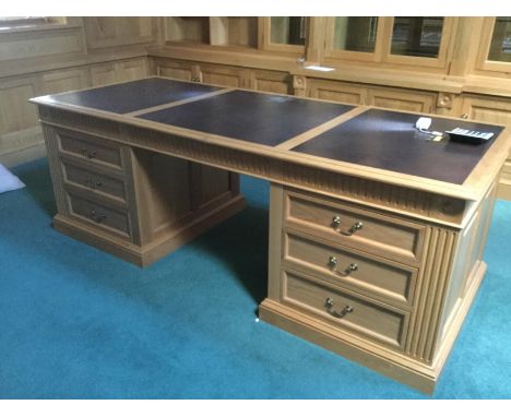 Bespoke craftsman made superior quality polished light oak panelled office study library desk fitted with fifteen drawers (9+