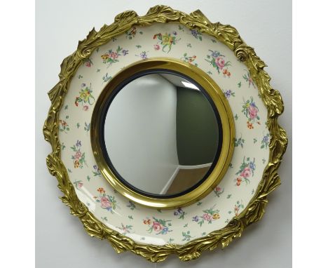 Wilkinson 'by Clarice Cliff', ceramic and metal bound circular mirror, D49cm Condition Report Click here for further images, 