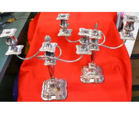 A pair of Old Sheffield plate, twin branch triple sconce table candelabra