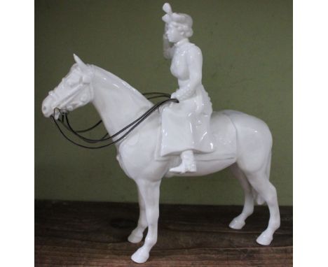 A John Beswick Archive white glazed ceramic Queen Elizabeth on horseback at Trooping the Colour, 26cm high, in a Beswick Conn