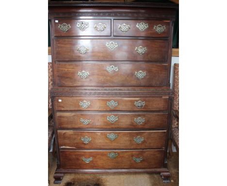 A George III mahogany chest on chest, carved bead-work &amp; frieze, top &amp; bottom with quarter columns, top section fitte