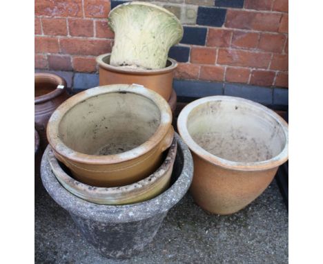 A cast planter with moulded leaf decoration, together with other planters, various (8)