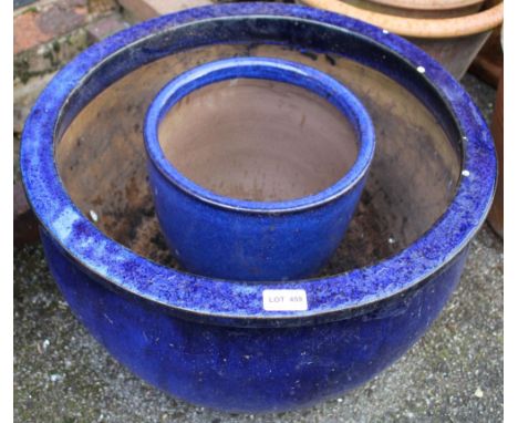 A large &amp; small blue glazed garden planter