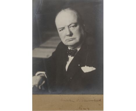 CHURCHILL (WINSTON)Portrait photograph by Walter Stoneman, SIGNED BY CHURCHILL,  gelatin silver print, half length, looking i