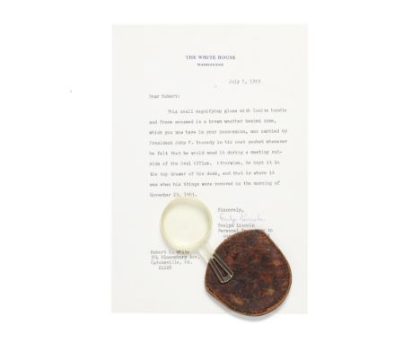 KENNEDY (JOHN FITZGERALD)A magnifying glass used by Kennedy during his presidency,  lucite handle and frame, handle embossed 