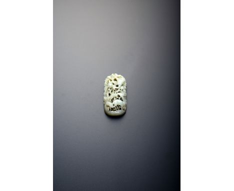 A CHINESE CELADON OPENWORK JADE OVAL PLAQUE YUAN/MING DYNASTY Finely carved in high relief with a deer and a crane amongst ex