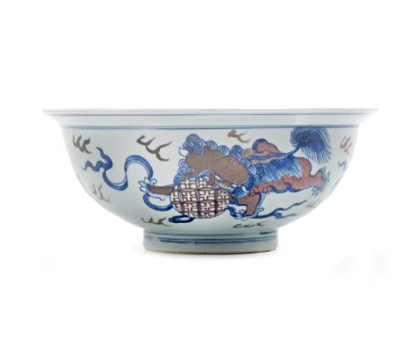 A CHINESE UNDERGLAZE BLUE AND IRON-RED BOWL SIX CHARACTER QIANLONG MARK AND OF THE PERIOD 1736-95 Painted to the exterior wit