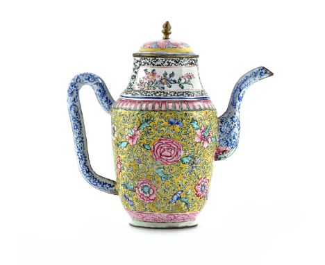 A CHINESE CANTON ENAMEL EWER AND COVER 18TH/19TH CENTURY Decorated with a dense scrolling flower design with leaves and folia