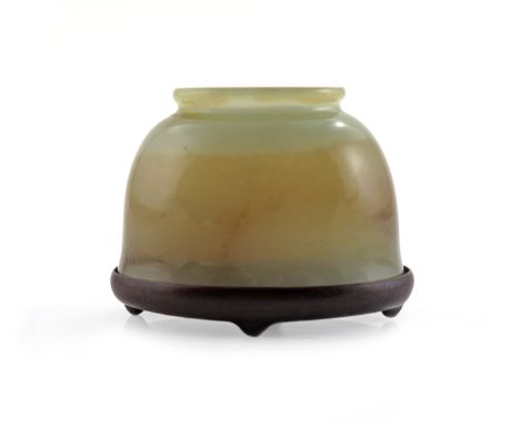 A CHINESE CELADON JADE BRUSH WASHER QING DYNASTY Of plain oval form with a slightly flaring foot, and with an everted neckrim