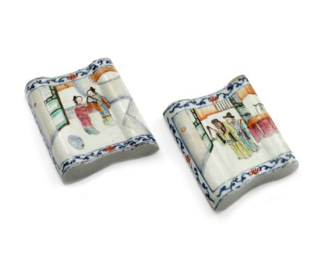 A PAIR OF CHINESE FAMILLE ROSE WALL VASES 19TH CENTURY Each formed as an open scroll, one painted with two ladies, one holdin