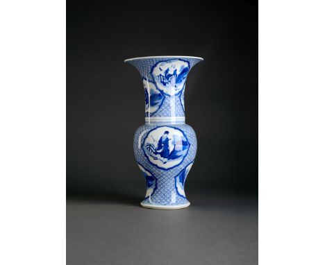 A CHINESE BLUE AND WHITE YEN YEN VASE KANGXI 1662-1722 Painted with panels depicting the Eight Immortals, reserved on a lozen