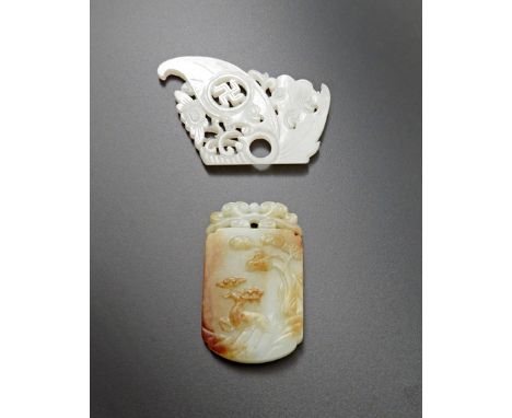 TWO CHINESE PALE CELADON JADE PLAQUES QING OR LATER One carved in relief with a deer holding lingzhi in its mouth beneath pin