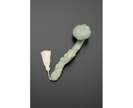 A CHINESE PALE CELADON JADE RUYI SCEPTRE 19TH/20TH CENTURY Carved naturalistically with fungi and bats, 26cm.  Provenance: fr