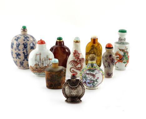 TEN CHINESE SNUFF BOTTLES 19TH AND 20TH CENTURIES In porcelain, glass, enamel, soapstone and silver, 8.5cm max. (10) 