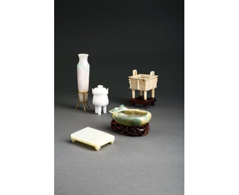 FIVE SMALL JADE ITEMS LATE QING DYNASTY One nephrite, formed as an ink stone, the others jadeite, formed variously as a brush