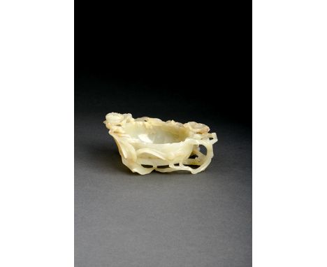 A CHINESE PALE CELADON JADE CAGE CUP MING/QING DYNASTY Carved as a mallow flower, encircled by smaller flowers and leafy tend