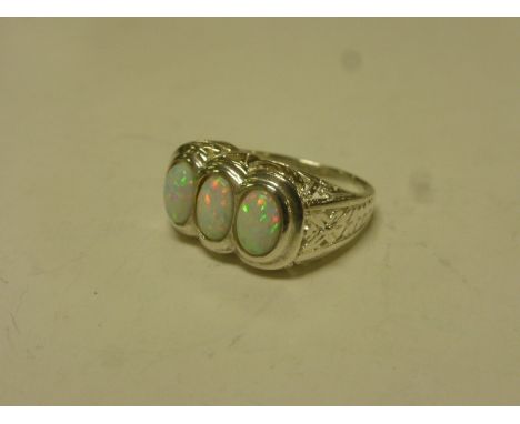 Silver and Opal Three Stone Ring in a Filigree Mount