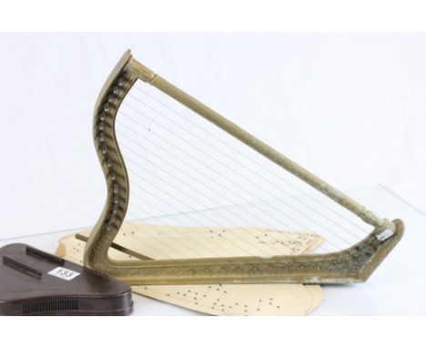 Small vintage Italian harp with paper instructions
