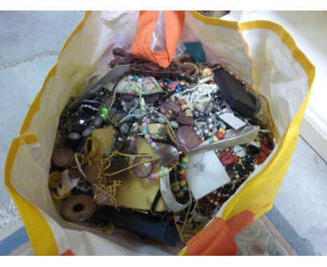 A large bag of vintage & modern costume jewelllery