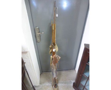 Group of vintage fishing rods etc