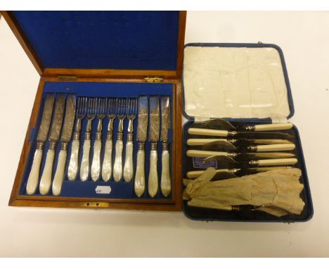 Two vintage sets of boxed cutlery