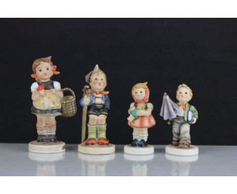 Group of eight Goebels Hummel figures to include four with boxes