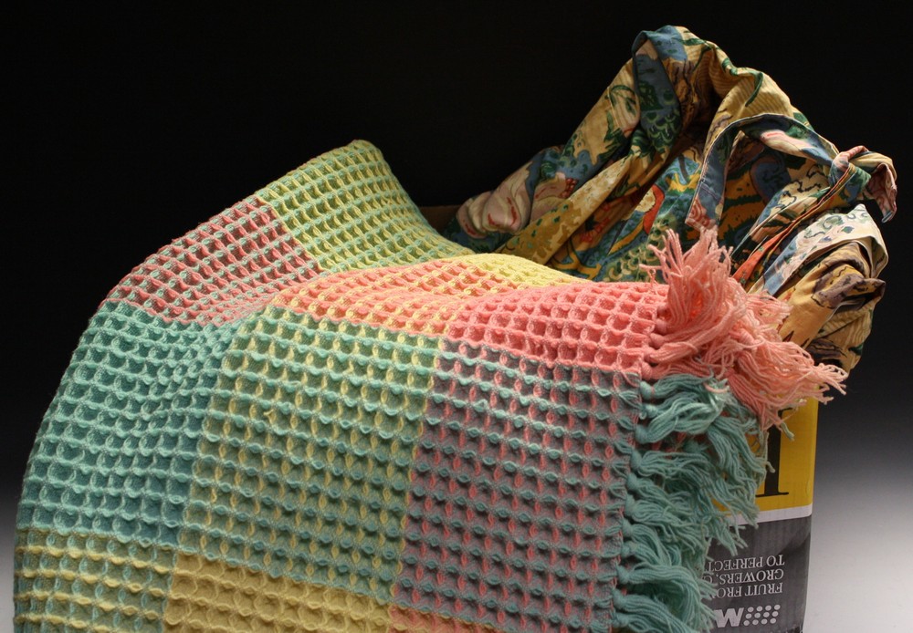 Textiles Welsh waffle wool blanket; a pair of Warner