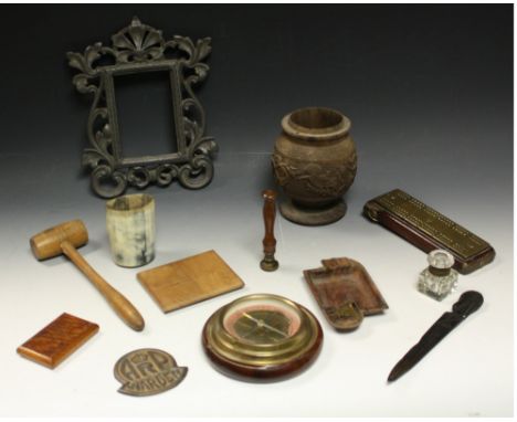 A brass and mahogany cribbage board; a brass wall hanging circular wheel barometer; a pewter photograph frame; a horn beaker;