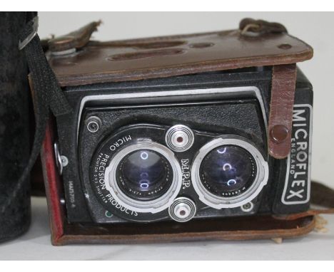 A Microprecision Products Microflex medium format camera with Micronar lense 77.5mm, f/3.5 no. 16162 and second lense no. 282