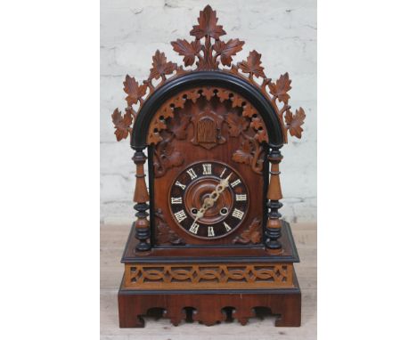A late 19th century black forest cuckoo clock, the brass twi spring driven movement striking on single coil stamped G.H.S. an