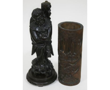 A Japanese carved hardwood lamp base on stand, height 40cm, and a carved bamboo brush pot, height 30cm.  