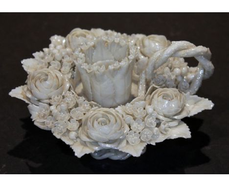 A Belleek first period boudoir chamber stick, circa 1863-1890, diam. 15cm.  Condition - chip and missing piece to inner ring 