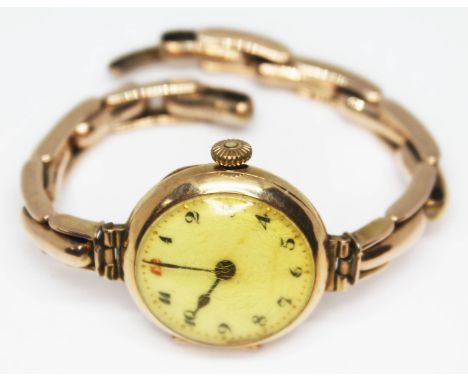 A vintage 9ct gold wristwatch with 9ct gold strap, as found, gross wt. 20.73g.  Condition: watch not currently working althou