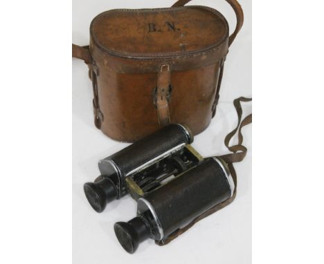 Two pairs of binoculars comprising a pair of German C.P. Goerz 12x binoculars with leather case and a pair of French Lemaire 