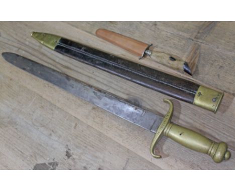 A 19th century brass handled short sword and scabbard with various stamps, together with a hoof handled letter opener with le