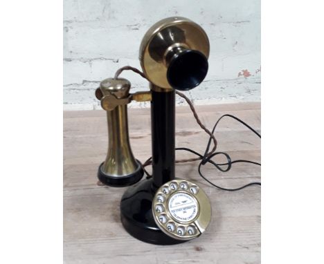 An early 20th century candlestick telephone.Condition:  a couple of dings to the handset as pictured, otherwise very good ove
