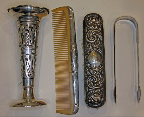 A mixed lot of hallmarked silver comprising a pierced vase, a pair of Georgian sugar tongs, a brush and comb, together with a