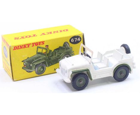 Dinky Toys No.674 Austin Champ 'UN' in a green and white body, housed in a pictorial card box, some light play wear with reto