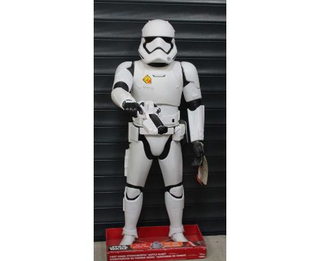 Disney Star Wars very large scale interactive action figure of a First Order Stormtrooper, strung to a pictorial cardThere is