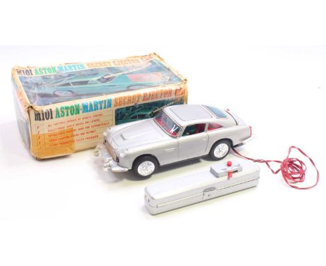 James Bond 007, United (Japan) M101 Aston Martin Secret Ejector Car battery operated by remote control, silver tinplate body 