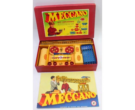 French Meccano outfit no.6A, in gold and blue components, with some components still wrapped in the original Meccano paper, s