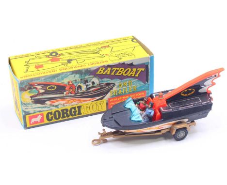 Corgi Toys No. 107 Batboat And Trailer, 1st issue with tinplate fin complete with Batman &amp; Robin figures, gold trailer, c